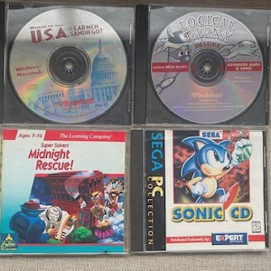 LOT of 4 Vintage Classic CD Games for PC including Sonic, Midnight Rescue, Carmen Sandiego & Logical Journey of the Zoombinis Circa 1990&#39;s