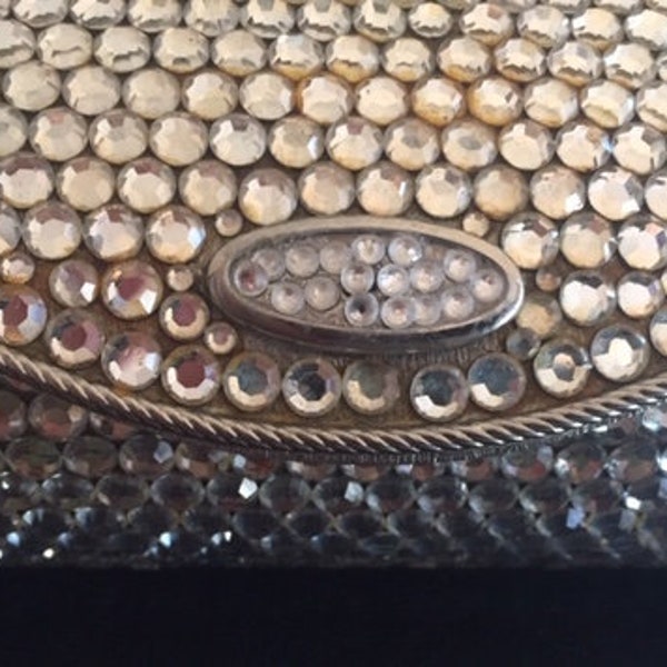 Vintage La Jeunesse NYC Oval Crystal Embellished Minaudière Evening Clutch with Bejeweled Clasp and Inside Mirror Circa 60's