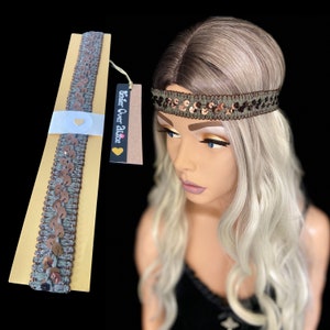 May include: A decorative headband with copper-colored sequins and a woven olive green and brown band. The headband is displayed on a mannequin with blonde hair. The tag reads "Tinker Over Alice".