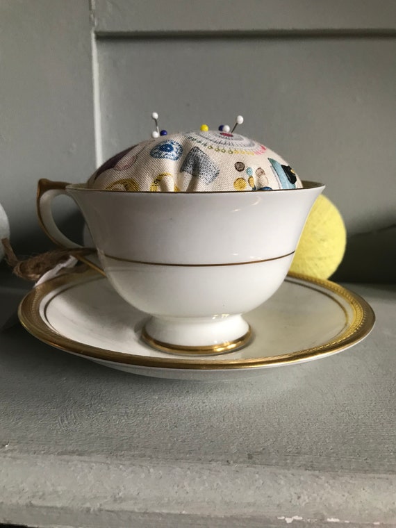 Vintage teacup pincushion. Pin cushion