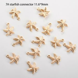 May include: A set of 14 gold-toned starfish connectors, each measuring 11.6 mm by 9 mm. The connectors have two loops on each side, allowing them to be attached to jewellery or other crafts.