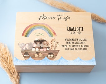 May include: A wooden box with a rainbow, a Noah's Ark, and animals on the lid. The text on the lid reads "Meine Taufe", "CHARLOTTE", "14.04.2024", "WAS IMMER DIR BEGEGNET INMITTEN DIESER WELT, DA IST EINE HAND DIE DICH LEITET, EINE HAND DIE DICH HÄLT."