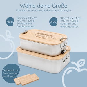 May include: Two stainless steel lunch boxes with bamboo lids are stacked. The top lid has the text "GUTEN HUNGER PAPA wir haben dich lieb MATILDA & AMELIE". The text "W&auml;hle deine Gr&ouml;&szlig;e" is at the top. The smaller box is 17.5 x 9.5 x 4.5 cm.
