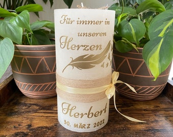 Memorial candle or mourning candle with a feather motif personalized with a name with a gold motif. Color freely selectable