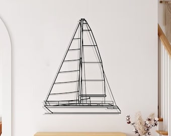 May include: A black metal sailboat wall decor with a minimalist design. The sailboat is mounted on a white wall above a wooden console table with two woven baskets and a white towel.