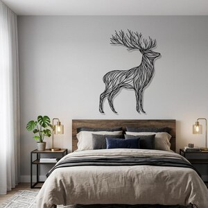 May include: A black metal deer wall art decorates a bedroom wall above a bed with a wooden headboard. The deer is stylized with an intricate, flowing design. The room has neutral tones with a window and side tables with lamps.