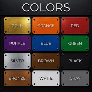 May include: A black metal panel displays rectangular color swatches in gold, orange, red, purple, blue, green, silver, brown, black, bronze, white, and gray. The word "COLORS" is at the top.
