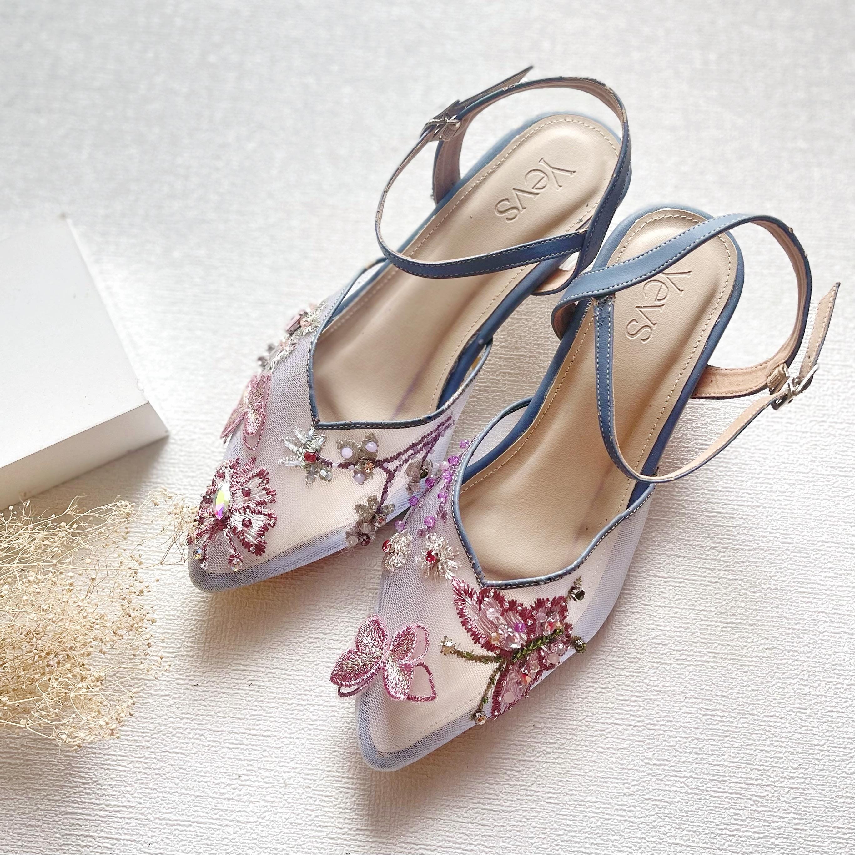 Blue butterfly heels