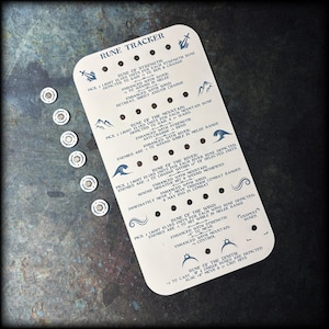 May include: An off-white Rune Tracker card with black text and blue illustrations, alongside six small, silver tokens. The card details game mechanics. The tokens are circular with a silver finish. Measurements are not applicable.