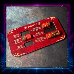 May include: A rectangular red game tracker board with white text and four recessed slots for dice. The board features the title BLESSINGS and lists rules for Bloodlust, Invigoration, Carnage, Excellence, Blades, and Decapitating. Six red and black marbled dice are placed in the slots.