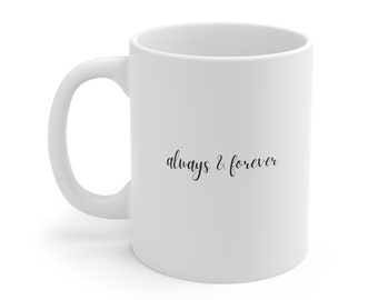 May include: White ceramic coffee mug with a black inscription that reads "always & forever".