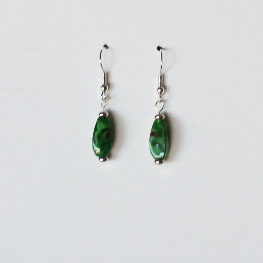 Green and silver dangle earrings Etsy