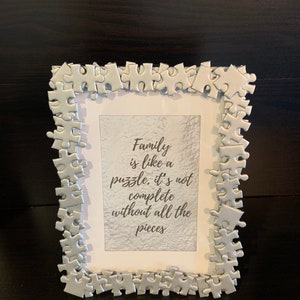 Puzzle framed family quote
