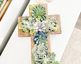 Stunning! Faux succulent arrangement in a hand carved wooden cross dough bowl! 17”L x 12”W x 3”D