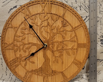 Tree of life clock carved from oak