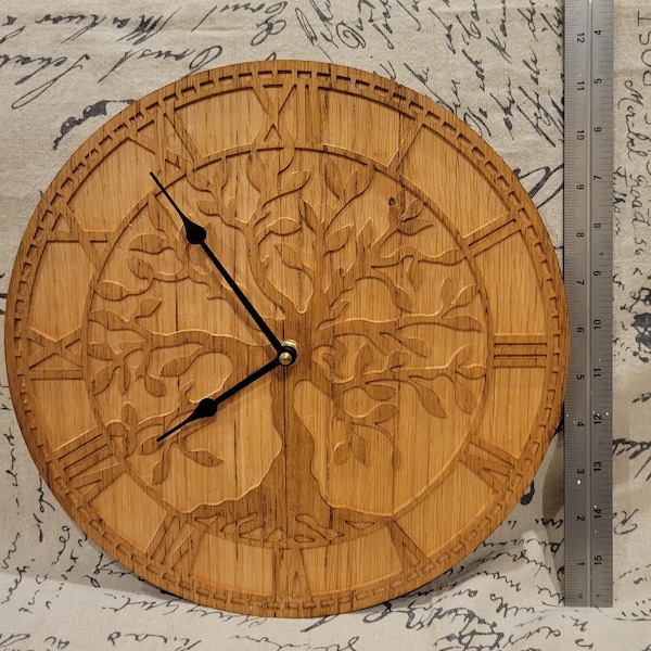 Tree of life clock carved from oak