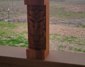 Carved tiki oil burning tabletop totem