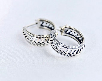 Chunky silver hoop earrings · High-quality unisex jewelry · Unique and elegant design · Handmade in London · Minimalist style · 925 silver.