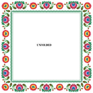 May include: A white square frame with a green border and a floral pattern. The floral pattern is red, yellow, blue, and green. The word "UNFOLDED" is in the center of the frame.