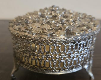 Vintage Gold Tone Filigree Footed Round Trinket Box with Floral Repoussé Lid