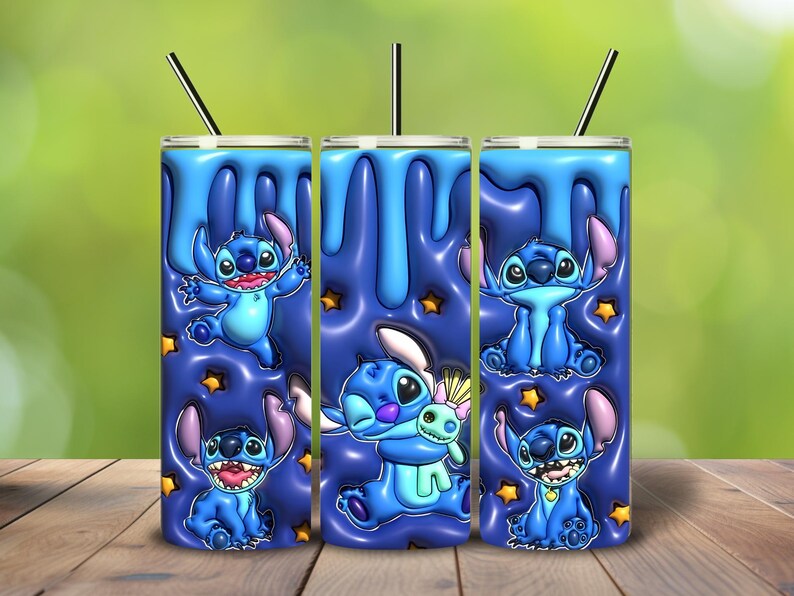 May include: Three blue tumblers with a cartoon Stitch design. The tumblers feature a blue background with a dripping effect and Stitch illustrations. Each tumbler has a black straw.