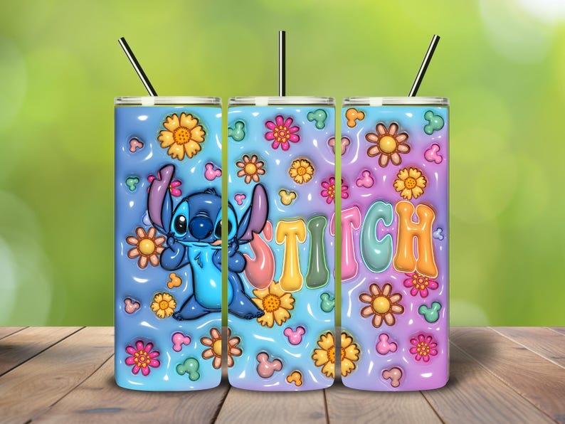 May include: A set of three insulated tumblers featuring a cartoon character, Stitch, surrounded by flowers and Mickey Mouse icons. The word "STITCH" is displayed in colorful bubble letters. Each tumbler has a black straw.