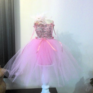 pink dress form christmas tree Are you a PINK Christmas decor, gal? This Dress Form Christmas Tree brings  out the prissy Barbie Doll in you. There is no limit to the colors and  styles you can use