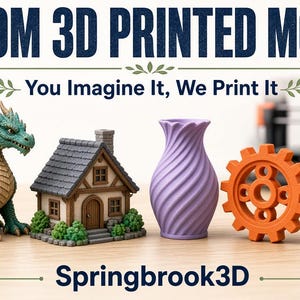May include: A collection of 3D printed models including a green dragon, a small house, a lavender vase, an orange gear, and a white robot. The text reads CUSTOM 3D PRINTED MODELS, You Imagine It, We Print It, and Springbrook3D.