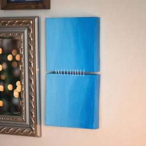 hanging by a thread - abstract blue embroidered acrylic painting on canvas