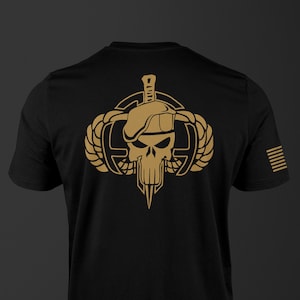 Available 22JUL2025. 82nd Airborne Skull Metallic Gold on Black Polyester with soft cotton feel T Shirt