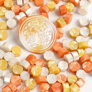100PCS Saco pequeno cheio de cera de laca octogonal, cera especial para selar selos, contas de cera de alta qualidade, contas de cera para selo de cera