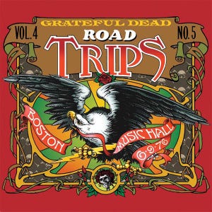 May include: A vintage-style graphic with a red background features an eagle with outstretched wings. The text "Grateful Dead Road Trips" is prominent, along with "Boston Music Hall 6-9-76." The design includes floral and skull motifs.