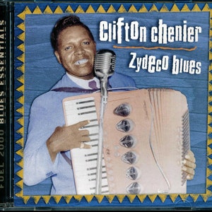 May include: A black and white photo of Clifton Chenier playing a pink accordion. The text "Clifton Chenier" and "Zydeco Blues" is written in white on a blue background.