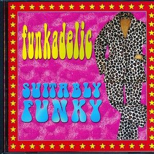May include: A pink and red CD case with a yellow and blue graphic that says "funkadelic" and "suitably funky". A person wearing a leopard print outfit is in the background.