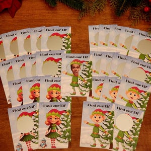 May include: A collection of Christmas-themed cards with the text "Find our Elf". The cards feature illustrations of elves in green and red outfits, with a cutout for a face. Some cards have a photo of a person's face.