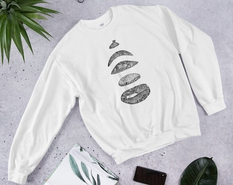 May include: White sweatshirt with a black graphic design of a stack of five overlapping circles with a textured pattern.