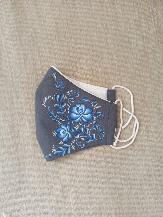 thumbnail interactive-video image 1 of Breathable Cotton/Linen Face Mask - White Flowers, Washable, Adjustable Straps, Adult 1 of 2
