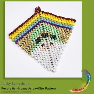 May include: A colorful beaded arrow or kite shape made with peyote stitch herringbone pattern. The design features a green, black, and white leprechaun face. The text "Lucky Leprechaun" and "Peyote Herrinbone Arrow/Kite Pattern" is visible below the beaded shape.