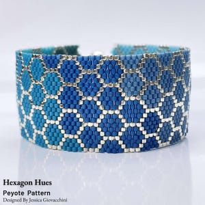 May include: A wide cuff bracelet featuring a repeating geometric honeycomb pattern in shades of blue, teal, and light blue, accented with metallic silver beads. The text "Hexagon Hues Peyote Pattern Designed By Jessica Giovacchini" is visible.
