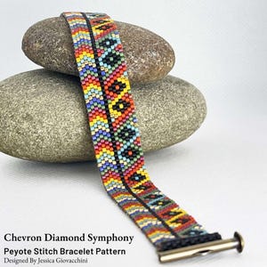 May include: A woven peyote stitch bracelet featuring a vibrant chevron and diamond pattern in red, orange, yellow, green, blue, and black beads. The bracelet includes a metallic slide clasp and is labeled Chevron Diamond Symphony Peyote Stitch Bracelet Pattern Designed By Jessica Giovacchini.