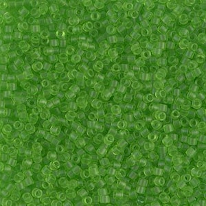 May include: A collection of small, cylindrical, translucent lime green beads arranged in a dense, uniform pattern. Each bead features a central hole and a smooth, glass-like finish, creating a consistent texture across the entire surface area.