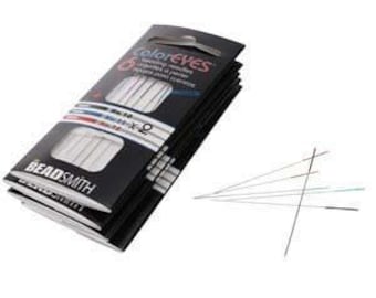 May include: A pack of Beadsmith ColorEYES beading needles with black packaging featuring white text. The set includes six needles with coloured eyes in various sizes, including No. 10 and No. 12, displayed both inside the clear plastic windows and fanned out.