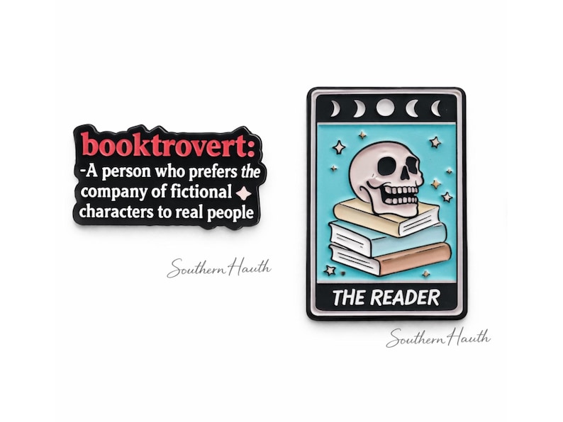 May include: Two enamel pins. One is a black rectangular pin with the text "booktrovert: -A person who prefers the company of fictional characters to real people". The other is a rectangular pin depicting a skull on a stack of books with "THE READER".