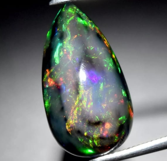 RARE !! OPALE NOIRE ET MULTICOLORE D'ETHIOPIE : 1,61 CARAT ★★ P359.129t