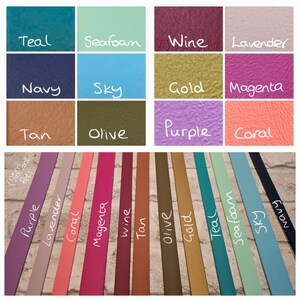May include: A collection of 14 leather straps in various colors, including teal, seafoam, wine, lavender, navy, sky, gold, magenta, tan, olive, purple, and coral. The straps are arranged in two rows, with the colors labeled below each strap.