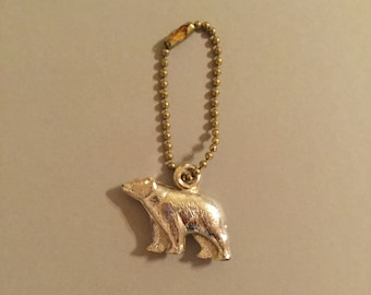 Vintage Plastic Silver Bear Key Chain, Charm, or Pendant. Fun addition to your key chain, back pack, zipper, pendant, or bracelet. Fun.