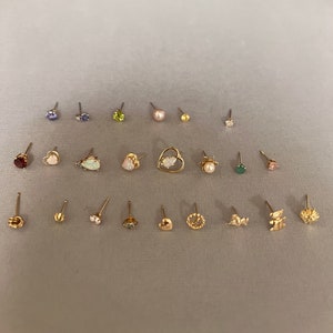 Variety of Single 14K Solid Gold Earrings. Sold separately. Receive one, not a pair.