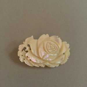 Vintage Mother of Pearl Carved Flower Brooch. Has a Beautiful Delicate Soft Touch and Look. Simple but Elegant.