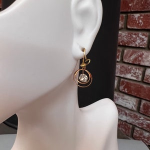 Vintage 9K Solid Gold Dangling Earrings. Has a Clear Stone (Not a Diamond).
