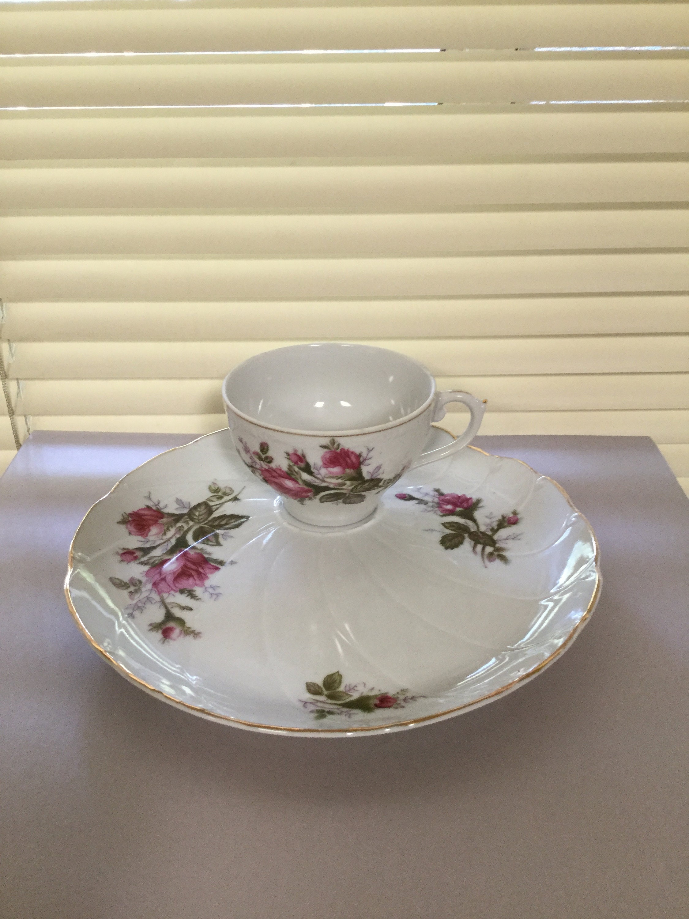 Vintage Tea Cup and Snack Plate. Has Beautiful Flower Designs and Gold Trim. A Perfect Addition to Your Tea Set and Tea Party.